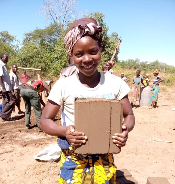 girl with a brick